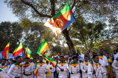 Spectators wave flags along the route of the Timkat procession, celebrating the baptism of Jesus and the Orthodox Epiphany. The official slogan for the 2021 celebrations was 'Ethiopia's Rebirth at Gon...