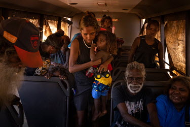 People on a council bus that serves the satellite communities on the edges of Wadeye town, helping residents to shop, attend school and access services found in the town. Due to tensions between triba...