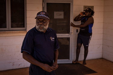 Wadeye's only local Aboriginal police liaison officer Greg Munur waits out the front of Wadeye police station. The area on the main road around the police station and courthouse has been the location...