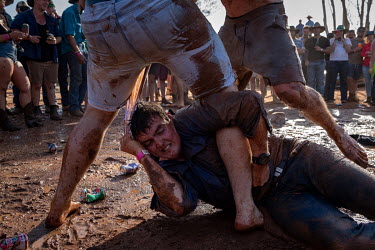 After the 'Wet T Shirt' competition, many of the men and some of the women start play fighting and wrestling in the mud at the Ariah Park Bachelor and Spinster ball.  Known to locals as simply B&S b...