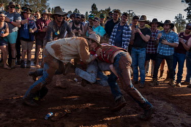 After the 'Wet T Shirt' competition, many of the men and some of the women start play fighting and wrestling in the mud at the Ariah Park Bachelor and Spinster ball.  Known to locals as simply B&S b...