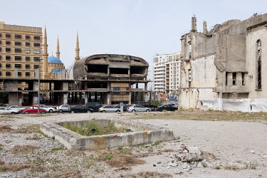 From right to left: A destroyed Catholic church, a ruined cinema complex and the new Al-Amin Mosque on the partly reconstructed Martyrs Square on the former demarcation line in the Lebanese capital. D...