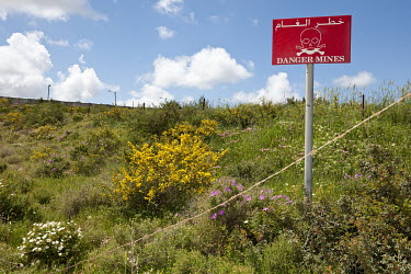 A landmines warning sign in a minefield near the Blue Line, on the Israeli Lebanese border.