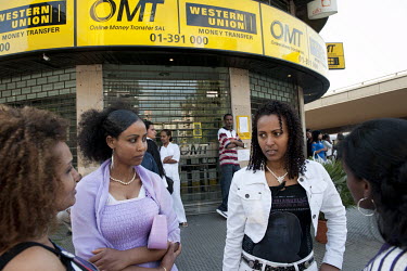 Ethiopian women in front of a Western Union office in the Dora neighbourhood.