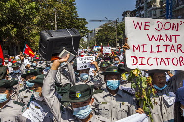 Staff from the government's Forestry Department join the protests to show their support for democracy, Aung San Suu Kyi and the National League for Democracy (NLD) and to protest the 1 February 2021 m...
