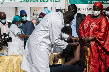 Health Minister Abdoulaye Diouf Sarr is injected with a dose of the Chinese made Sinopharm COVID-19 vaccine. After receiving 200,000 doses of Chinese Sinopharm vaccine, the immunisation campaign in Se...