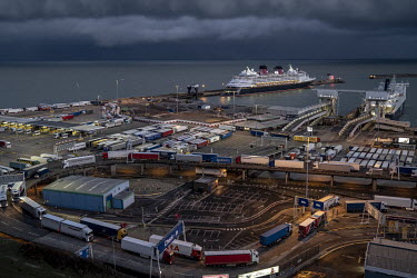 Trucks embark and disembark from ferries at Dover.