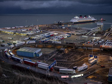 Trucks embark and disembark from ferries at Dover.
