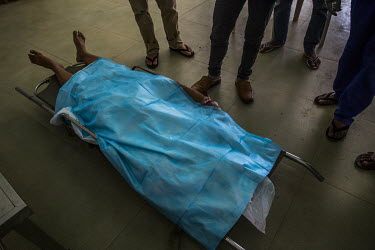 The body of Maung Maung Oo, 44, who died from a headshot wound fired by security forces as they sought to disperse anti-coup protestors.