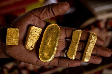 Ingots at a gold trader's workshop. Traders buy gold from the various artisanal gold mines that operate in the Sahara Desert in the north of the country and sell it in Dubai or India.