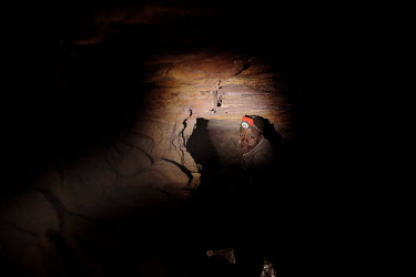 A youth working underground at the Tabelote gold mine.