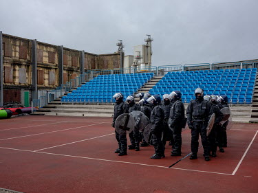 Police officers wearing riot gear during public order training at the Metropolitan Police's training centre in Gravesend.