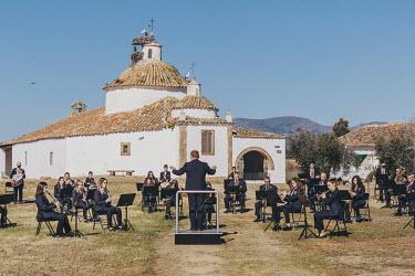 The Banda Municipal de Musica de Miajadas (Miajadas town orchestra) take part in a socially-distanced performance at the Ermita de San Bartolome (Church of Saint Bartholomew). Easter celebrations are...