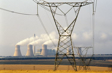 The Duvhu Power Station with pylons carrying power cables across nearby fields.