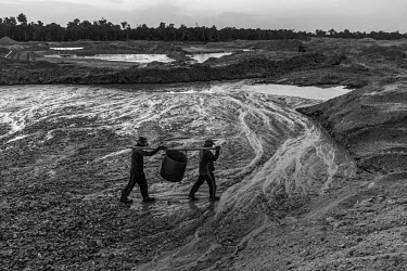 Men work in a gold mine in Peixoto de Azevedo in northern Mato Grosso, which is one of the largest gold producing areas in Brazil. Part of the extraction activity is illegal and even those legalised d...