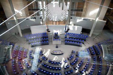 Signs read: 'Bitte Frei Lassen', 'please keep free', on chairs in the German parliament (Deutscher Bundestag) as delegates practice social distancing. Only every third chair was available to MPs in th...
