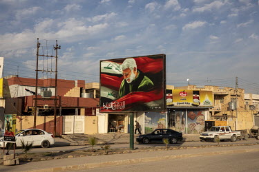 A billboard depicting the late Abu Mahdi al-Muhandis, the former head of the Iraqi Popular Mobilisation Forces, who was killed in the American drone strike targeting Iranian military commander Qasem S...