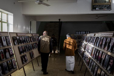 Photographs of the 103 Yazidi victims of ISIS, murdered in 2014, are displayed in the school building where ISIS extremists rounded up the boys, men and elderly women of the village before killing the...