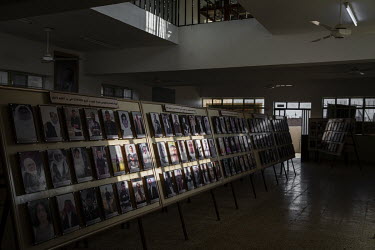 Photographs of the 103 Yazidi victims of ISIS, murdered in 2014, are displayed in the school building where ISIS extremists rounded up the boys, men and elderly women of the village before killing the...