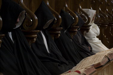 Carthusian monks praying at the Certosa monastery.