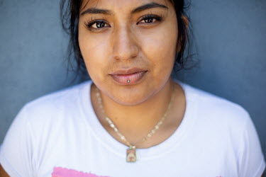 Jessica Garcia Garcia, 22, in her her home in Los Angeles. When the pandemic started Jessica was attending UC Santa Cruz and had to pack up her belongings and leave the dorms to come back to her paren...