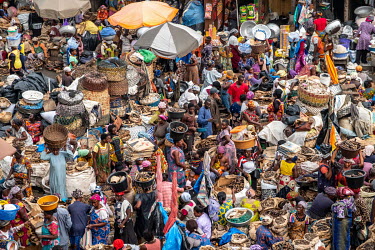 Shoppers and traders in Kejetia market (Kumasi Central Market). The market is among the largest in Africa, with more than 10,000 stalls selling virtually everything imaginable.