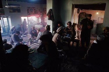 Men gather in a 'chai khana', tea house-restaurant.