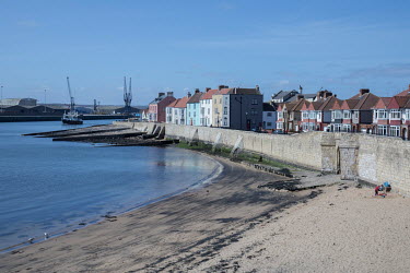 Georgian houses on the waterfront where the beach has been exposed by the receding tide.   Hartlepool has always voted Labour, including in the last General Election, when many neighbouring areas in L...