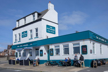 Socially distanced customers drinking outside the Pot House, a waterfront pub.  Hartlepool has always voted Labour, including in the last General Election, when many neighbouring areas in Labour's so-...