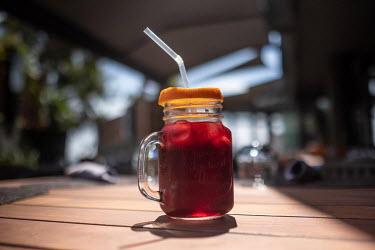 A glass of chilled hibiscus tea, or bissap, at an upscale restaurant in central Dakar.