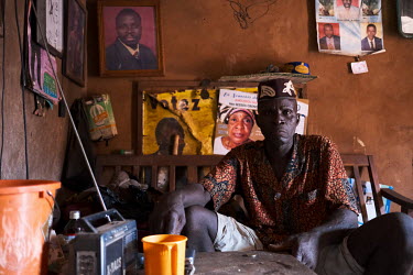Felix Gbetekanlin, who estimates his age at 65, is a traditional healer and head of a committee responsible for the restoration of a heavily degraded sacred forest grove in the village of Agonme. The...