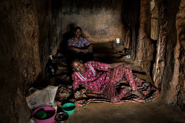 Patients whose ankles are shackled sit in a small dark cell at the Emmanuel Rehabilitation Centre for Mentally Ill People which is run by Miss Mojisola Adeniyi. They treat patients with injectable dru...