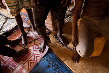 Patients at the Edwuma Wo Woho Herbal Centre, which houses about 30 people many with mental health conditions. At least half are shackled with chains. The centre is run by herbal doctor Irene Dadzie (...