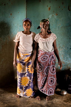 Maria Sabo (30) and her mother Laraba Sabo who has a mental health issue. Maria has taken care of her mother for the five months they've been at the Dr Amina Aliyu Shekwonya Herbal Centre. Maria prepa...
