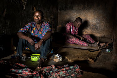 Patients whose ankles are shackled sit in a small dark cell eating food from plastic containers at the Emmanuel Rehabilitation Centre for Mentally Ill People which is run by Miss Mojisola Adeniyi. The...