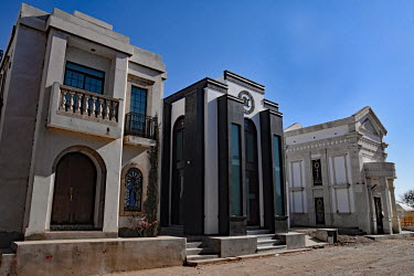 The Jardines de Humaya, a cemetery where many drug barons are buried. Even in death they try to outdo each other with pompous mausoleum architecture, some even three stories high.