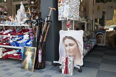 Catholic souvenirs and Marlboro cigarettes for sale in a shop in Medugorje, the site of Apparition Hill, a popular place of pilgrimage since 1981 when it was reported that apparitions of the Virgin Ma...