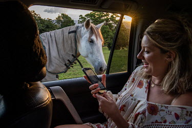 Influencer Lola Berry visits a horse ranch with her boyfriend who helps to take photos and videos, at The Ranch Byron Bay, to make content for her social media accounts.   The Byron Bay community is a...