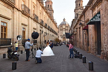 A wedding photographer at work in the beautiful colonial centre of Morelia.
