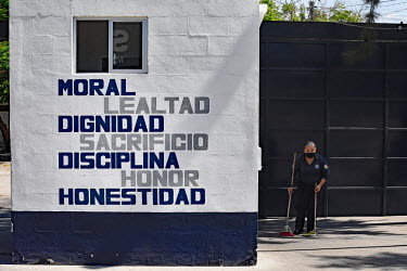 A guardhouse at the state police barracks decorated with various slogans: 'Honesty, Dignity, Loyalty, Discipline, Honor'.