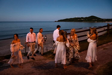 A wedding at Byron Bay Main Beach.  The Byron Bay community is at war with a proposed Netflix reality TV show called Byron Baes, which locals feel does not represent their town. A petition calling on...