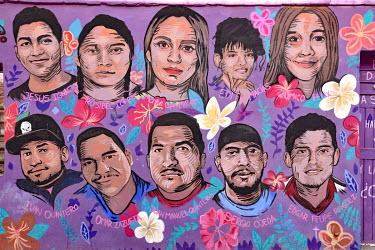 A wall mural featuring portraits of some of the disappeared people from the region.