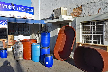 A hardware store selling plastic barrels and tubs of the type often used to to store and mix chemicals used in the manufacture of narcotic drugs and dissolve bodies in acid.