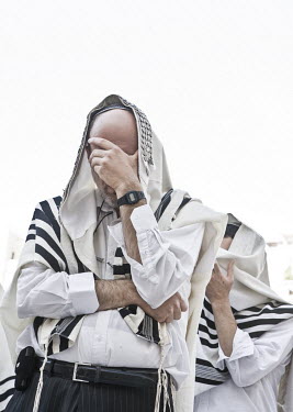 Orthodox Jews praying at the Wailing Wall during Passover.