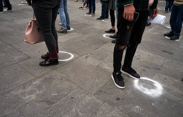 During the demonstration on Wenceslas Square against politicians, including the president, considered too close to Russia's Putin regime, protesters kept their distance with the help of chalk circles...
