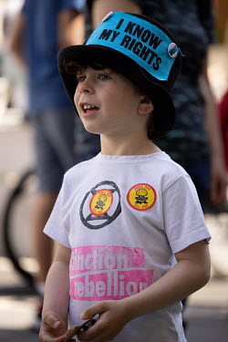 A child during a protest by scientists against Shell's sponsorship of 'Our Future Planet', an exhibition advocating techno-fixes for the climate crisis, at The Science Museum in South Kensington.