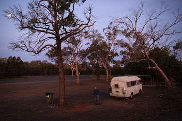 Barney Webb near his van parked for the night in a truck stop on the outskirts of Dubbo. The region has been inundated with mice. Barney has had to make several traps in his van where he currently liv...