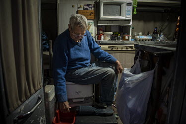Barney Webb in his van parked for the night in a truck stop on the outskirts of Dubbo. The region has been inundated with mice. Barney has had to make several traps in his van where he currently lives...