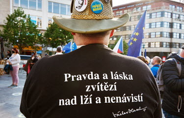 A man wears a t-shirt with a quote of late president Vaclav Havel that reads: ''Truth and love will overcome lies and hatred'', during a demonstration on Wenceslas' Square as thousands of Czechs expre...
