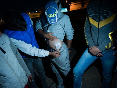A young Moroccan migrant displays wounds he claims were the result of being beaten by Spanish police after they illegally entered the Spanish exclave of Ceuta. Over a period of two days, the Moroccan...